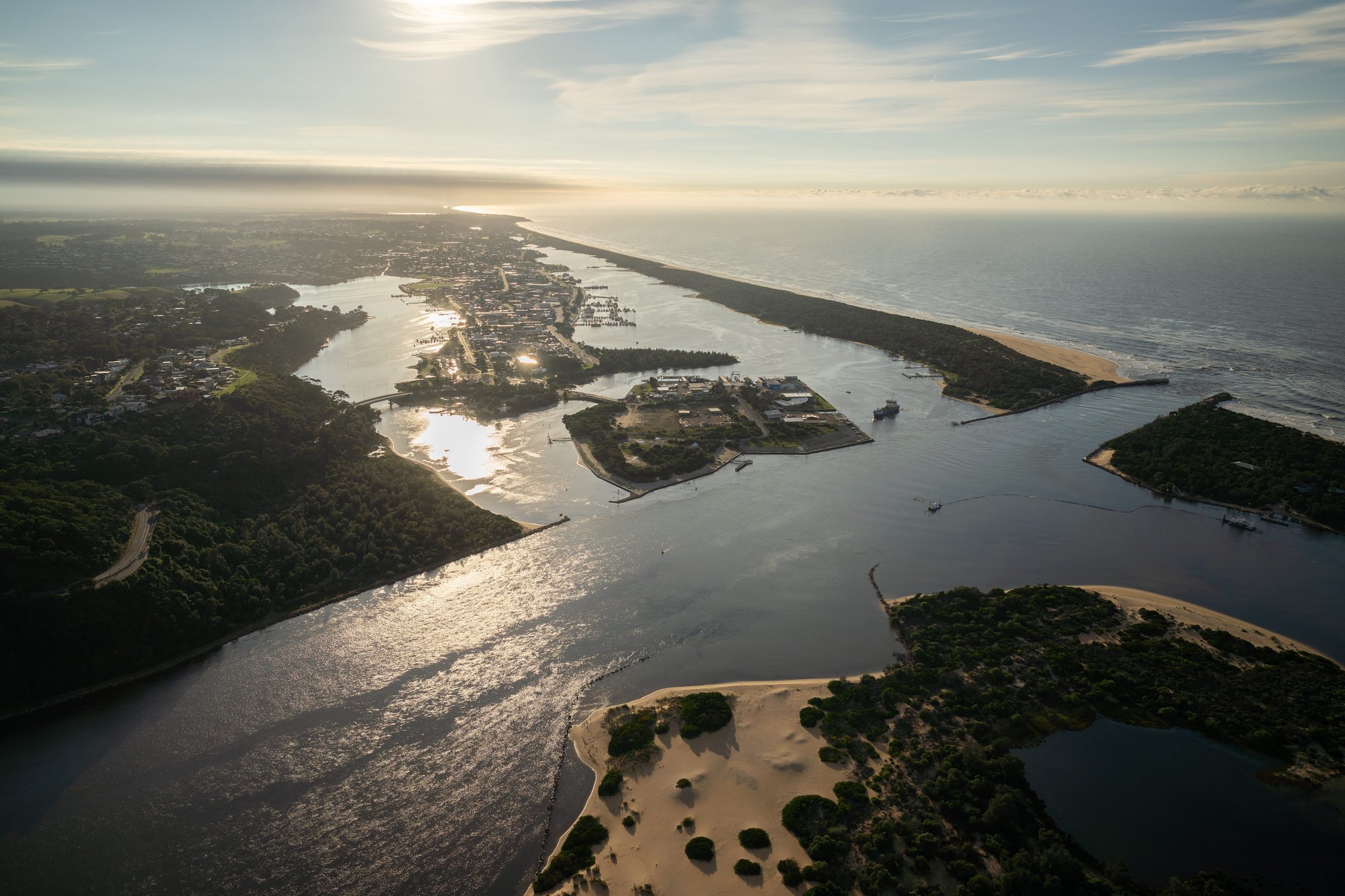 Sunrise over the Lakes Entrance channel and coastline