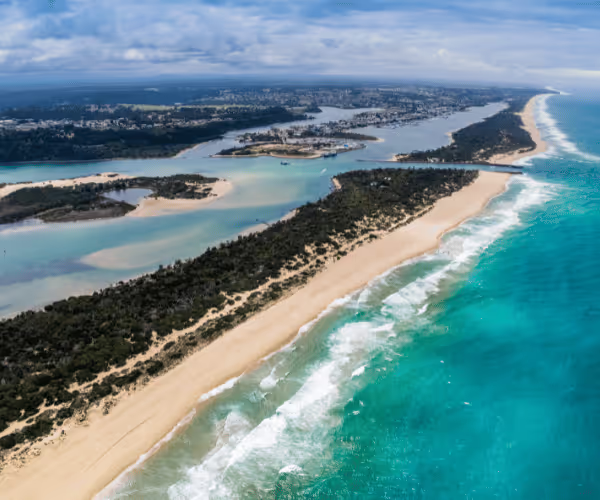 Aerial view of the Lakes Entrance channel and Ninety Mile Beach